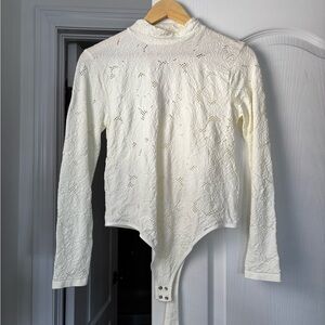 Elegant Cream Lace Bodysuit